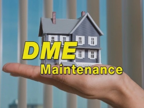 Professional chimney cleaning technician working on roof in Manhasset, NY