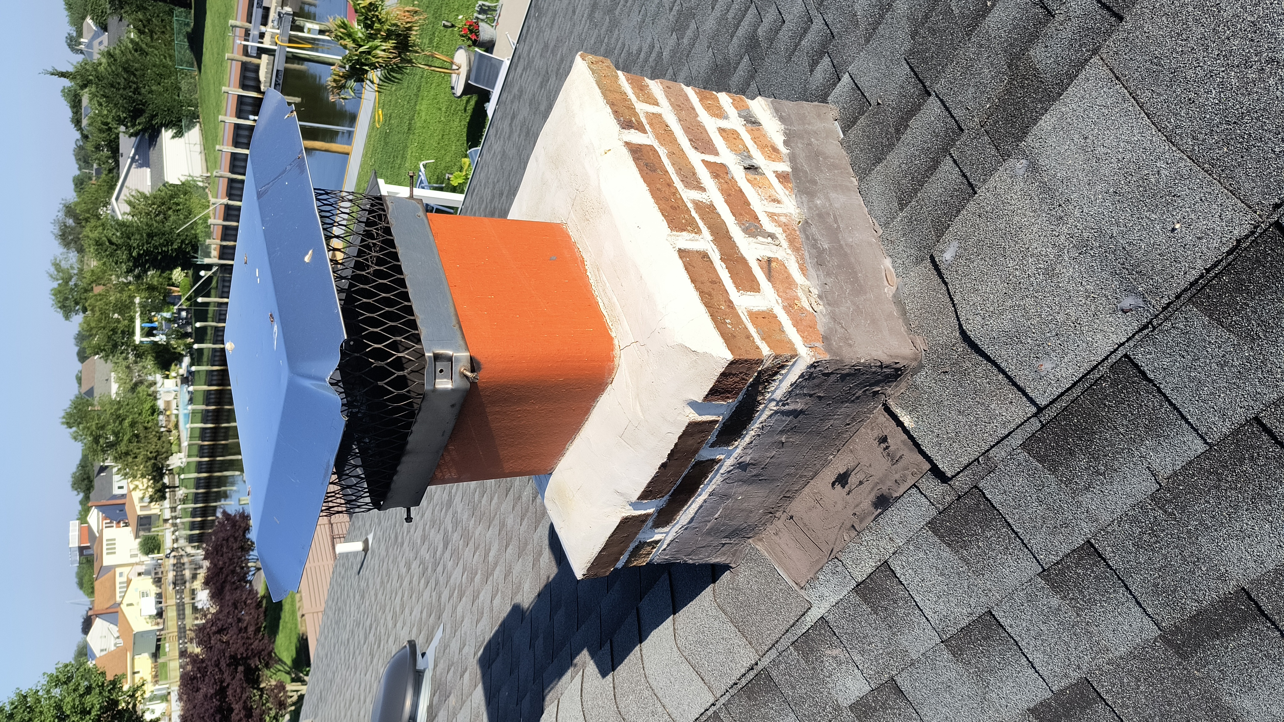 Full chimney masonry rebuild and restoration in Manhasset, NY
