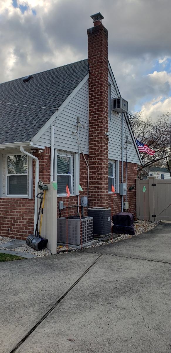 Professional chimney repointing restoring brick joints in Manhasset, NY